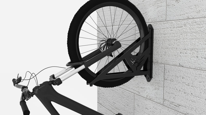 Peregrine MTB bike wall mount in black holding a mountain bike
